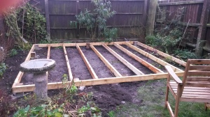 Base for decking laid
